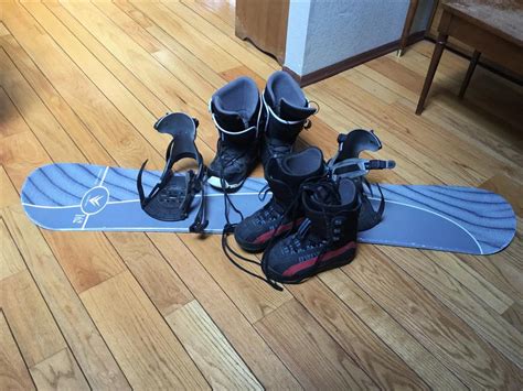 Snowboard and 2 pair of boots Saanich, Victoria