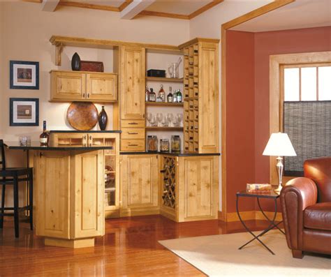 We will not be undersold. Rustic Alder Cabinets in Bar Area - Diamond Cabinets
