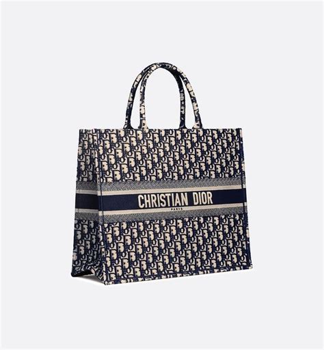 The book tote was inspired by a drawing produced by marc bohan in 1967, which was located in the house's. Dior Book Tote Blue Dior Oblique Embroidery - Bags - Women ...