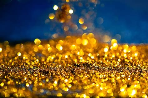Premium Photo Glitter Gold Lights Grunge Background