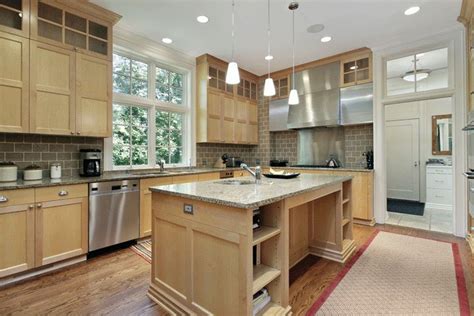 Sollid® cabinetry utilizes the same build process as custom cabinets, using glue and staples on every assembly. Granite Countertops with Oak Cabinets: Best Choices in ...