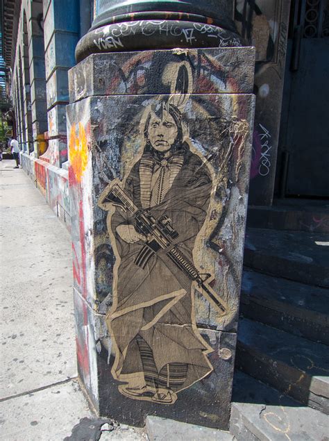 Native American With Gun Street Art In Soho Photo By