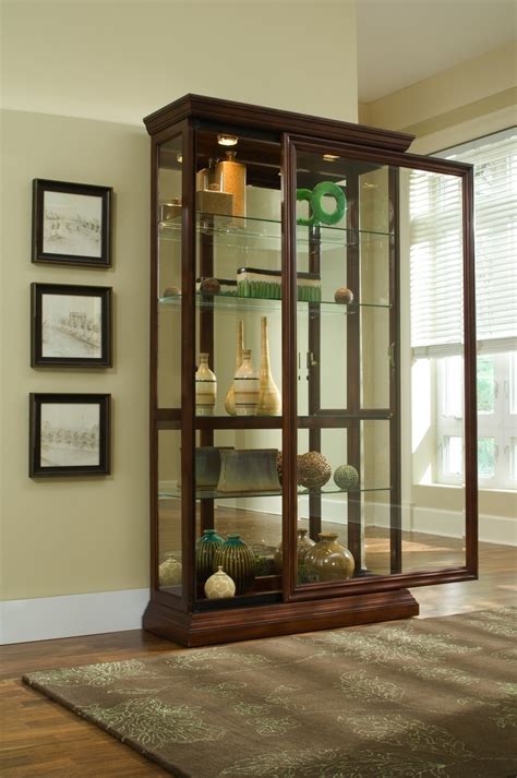 The pulaski curio cabinets are some of the most innovative and ornate designs on the market. 2 Way Sliding Door Curio Cabinet by Pulaski - 20542 ...