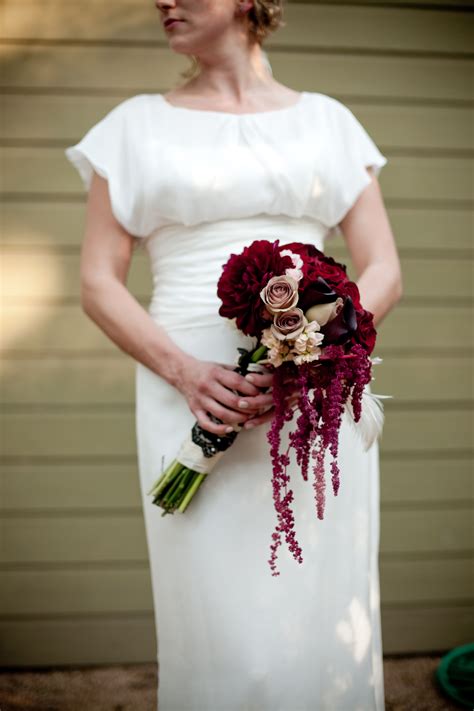 Other popular options include stargazer lilies, peonies, anemones, ranunculus, dahlias, and hydrangeas. modern yet vintage cascading bouquet | Red wedding flowers ...