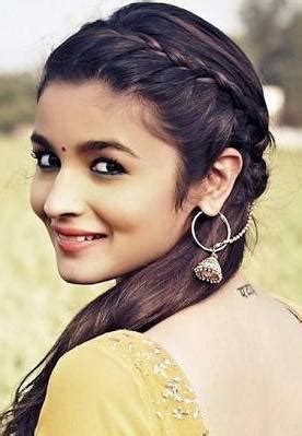 Long layered hair draws the eye downwards and makes your round face look longer. 25 Indian Hairstyles for Round Faces with Pictures