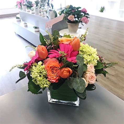 Some varieties naturally produce green flowers. Mini green hydrangea, orange tulips, Free Spirit roses ...