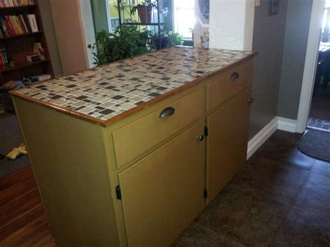 Maybe you would like to learn more about one of these? my husband repainted old cabinets and made a new top out ...