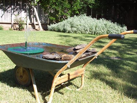 Garden Wheelbarrow Fountain For My Feathered Friends To Play In