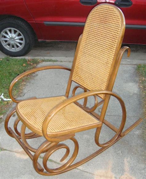 A rocking chair or rocker is a type of chair with two curved bands (also known as rockers) attached to the bottom of the legs, connecting the legs on each side to each other. ANTIQUE VINTAGE THONET? CANE BENTWOOD ROCKER ROCKING CHAIR ...
