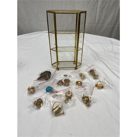 Small Glass Display Case Filled With Brass Trinkets From Holland