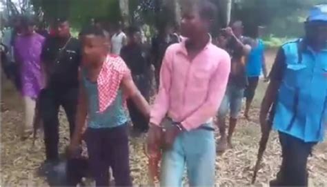 Two Black Axe Cult Members Nabbed With Weapons In A Bush In Imo State Photos Video