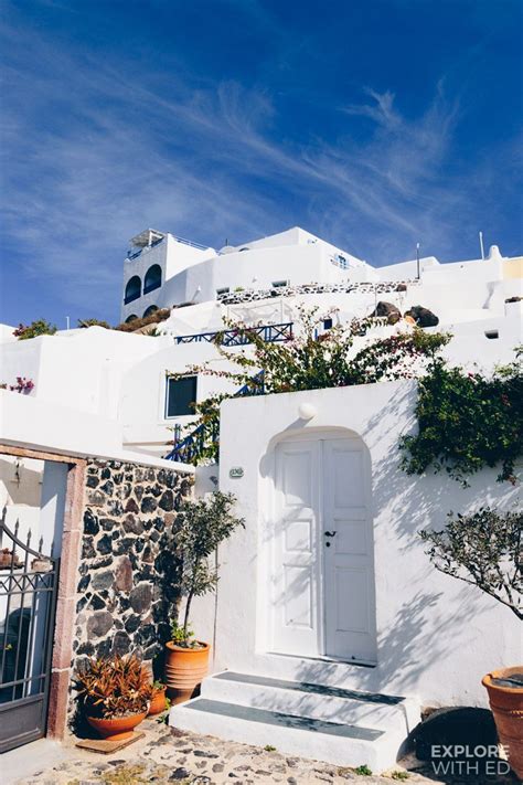 The Iconic White And Blue Buildings In Santorini Greece