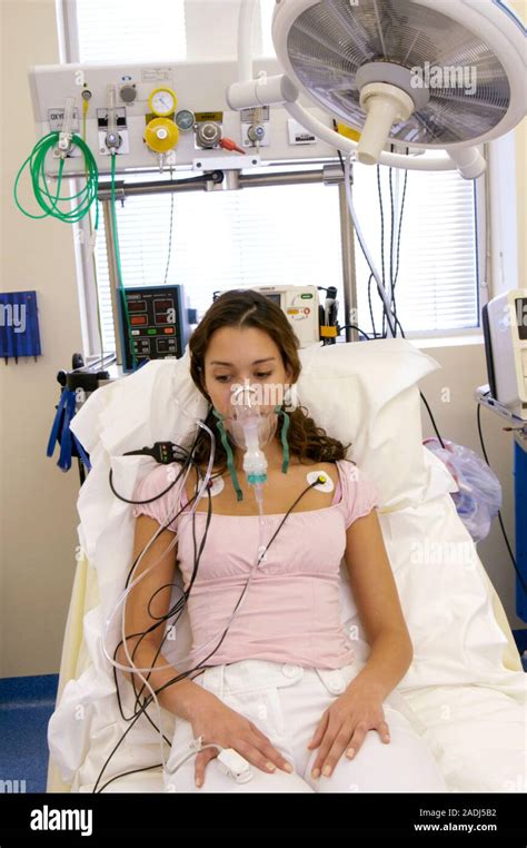 Ecg Test Young Woman Undergoing A Three Lead Electrocardiogram Ecg