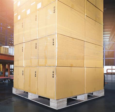 Stack Of Package Boxes On Wooden Pallet At Storage Warehouse Shipment