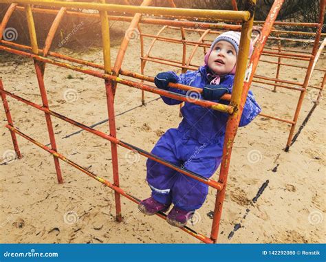 Child Climbing On Ladder At Playground Stock Photo Image Of Playing