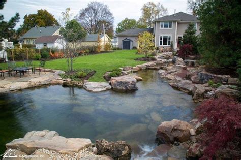 Choosing A Recreational Pond Over A Swimming Pool The Deck And Patio