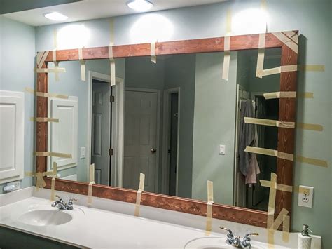 How To Install A Bathroom Mirror With Glue Everything Bathroom