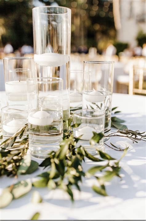 Simple Greenery With Floating Candles Wedding Centerpiece At The Powel