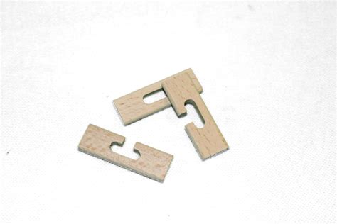 Diese kleinen puzzles aus holz sind ein echter kla… Das rätselhafte Kreuz | Knobelei | Puzzle | Schiebolds ...