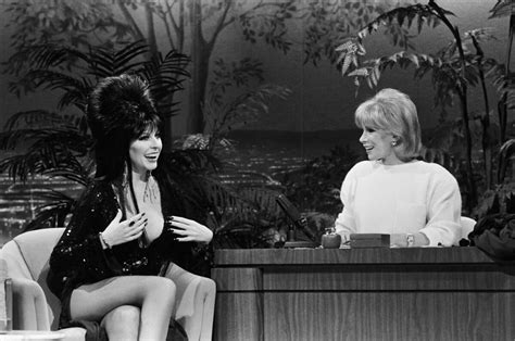 spooky spunky elvira celebrates 35 years of business with a coffin table book for fans