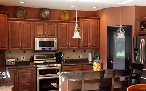 Although a natural / clear coat (no stain) is technically not a stain color, the application of just this clear finish will change the color and appearance of most solid wood and veneer. Chestnut Maple - Wood Cabinet Factory - Chestnut Kitchen Cabinets