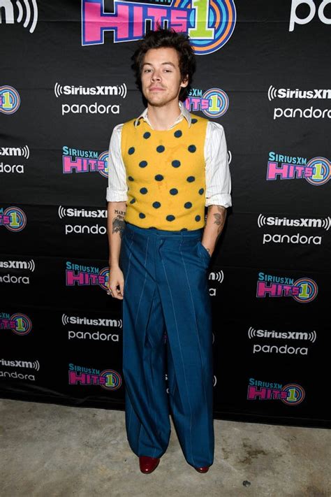 harry styles most daring outfits photos
