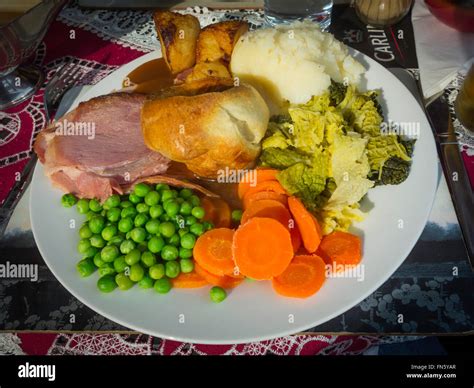 Traditional English Sunday Lunch Roast Gammon With Yorkshire Pudding