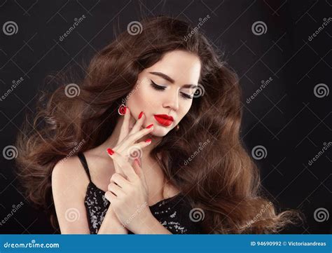 Manicure Red Lips Makeup Beautiful Brunette Girl With Long Blowing Shiny Wavy Hair Fashion