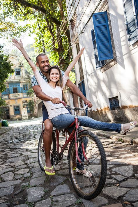 Portrait Of Couple Riding Bicycle Stock Image F0091707 Science