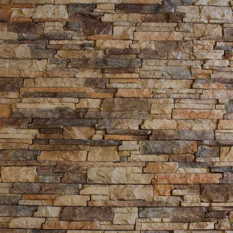 A Stone Wall With Brown And Tan Colors