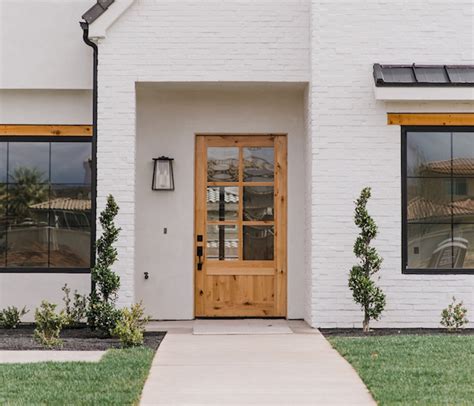 In the future we would like to paint the brick white to match. Q+A: Black or White Windows? - BECKI OWENS