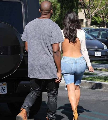 kim kardashian in denim bermuda shorts on date with kanye west menz magazine