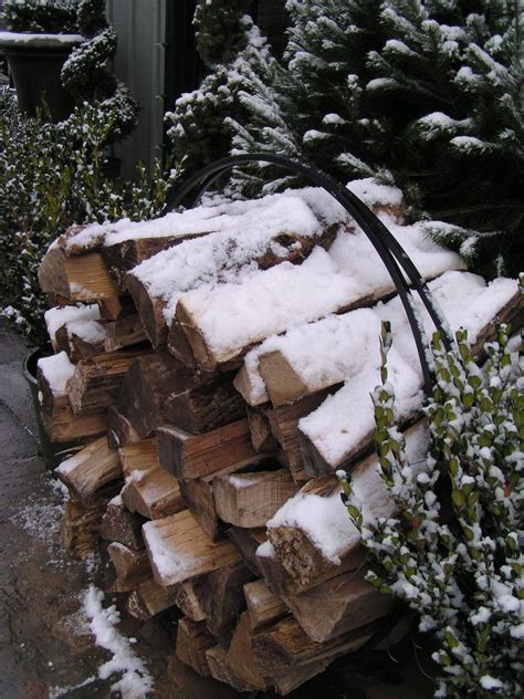 Even A Rack Of Firewood Looks Festive When Dusted With Light Snow