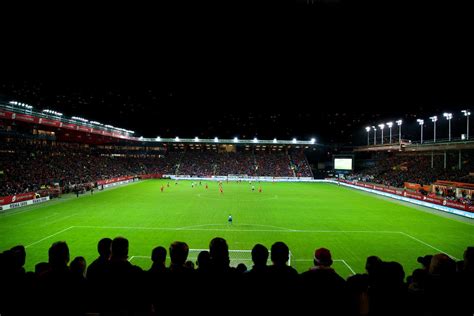 legg kunstgress på brann stadion nå