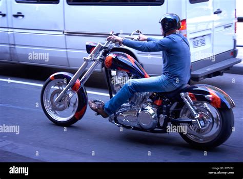 Man On A Harley Davidson Chopper Motorcycle On Melbourne City Street