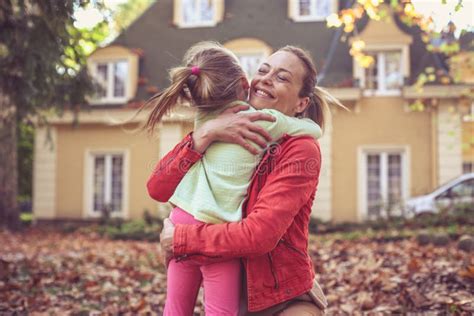 Little Girl Hugging Her Mother Share Love Stock Photo Image Of