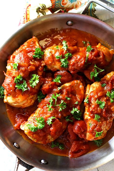This baked chicken breast recipe will have you roasting the meat with tomatoes and capers, then olive oil bastes the chicken in a savory broth; Skillet Tomato Chicken Breast Dinner - Bunny's Warm Oven