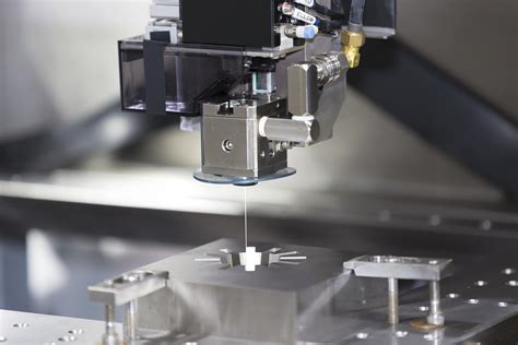 I love how you used a 3d printer bowden setup to push the wire. CNC wire cut machine cutting mold parts | Without Limits