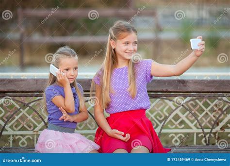 Two Joyful Girls Taking Selfie At Park Stock Image Image Of Enjoyment Beautiful 172459469