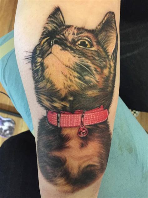 If you wanna make others trip out, the hand would be a good spot for animal or human heads with four eyes. Cat Tattoos for Men - Ideas and Inspiration for Guys