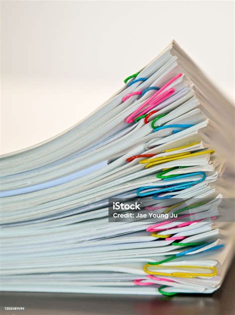 Piles Of Documents Piled Up On The Desk Stock Photo Download Image