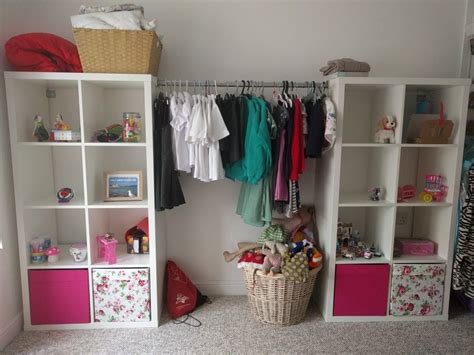 The doors and frame are white. IKEA Kallax + hanging rail = kids wardrobe (it'll never be ...