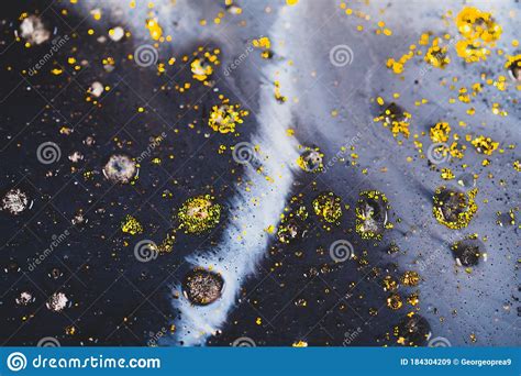 Macro Close Up Shot Of Golden Wet Glitter Golden Space