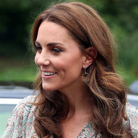 Kate Middleton Is All Smiles At Photography Workshop After Picking Up