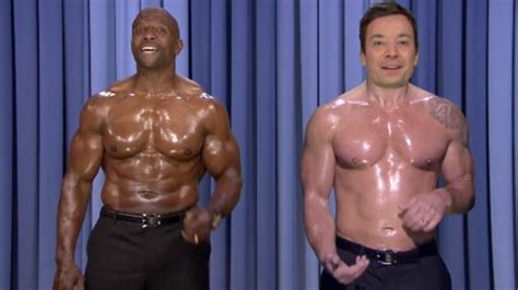 Jimmy Fallon Performs Shirtless Duet But Gets Help With His Muscles Daily Mail Online