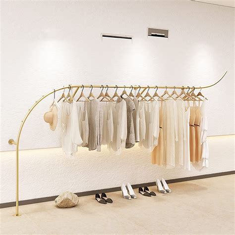 Creative Display Garment Racks In Boutique Clothing Stores Modern