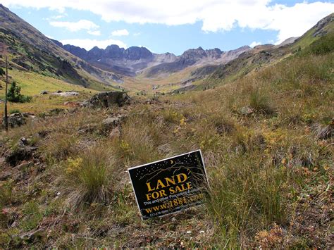 This is a few years old but. American Basin real estate for sale sign