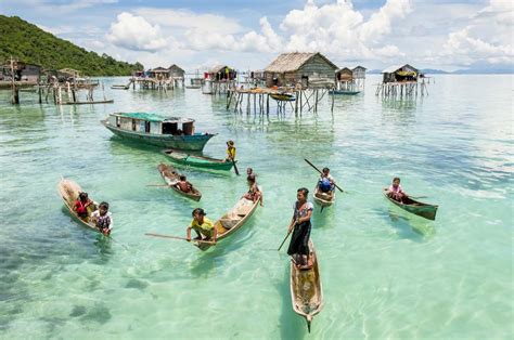 Bajau People Living On The Surface Of The Sea Freediving In United