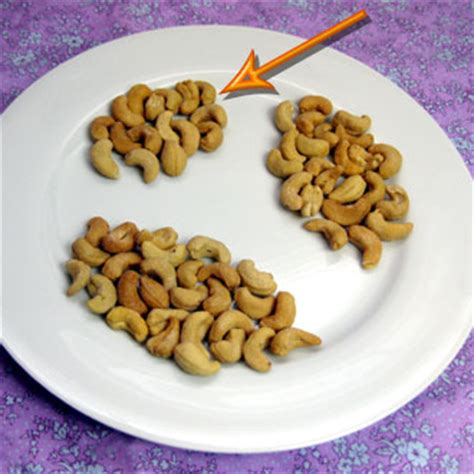 20 halves of pecans which weigh around 1 oz contain 196 calories. What One Ounce of Nuts Looks Like | POPSUGAR Fitness