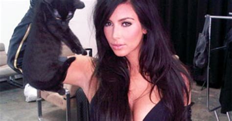Kim Kardashian Sparks Controversy Over Cat Photo Cbs News